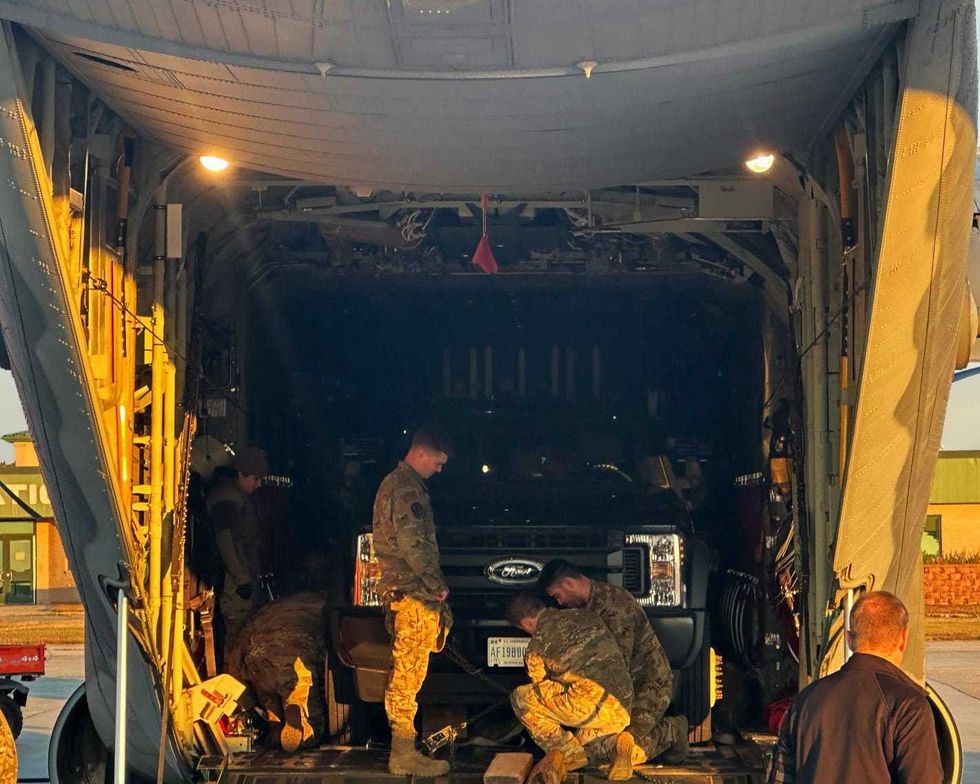 103rd Rescue Squadron pararescuemen, assigned to the New York Air National Guard 106th Rescue Wing, prepare search and rescue equipment for Hurricane Milton support at Francis S. Gabreski Air National Guard Base.