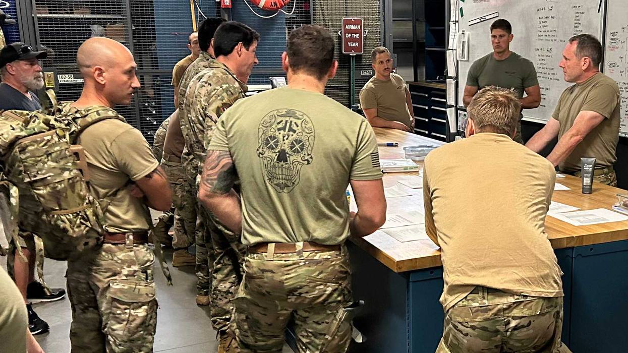 103rd Rescue Squadron pararescuemen, assigned to the New York Air National Guard 106th Rescue Wing, prepare search and rescue equipment for Hurricane Milton support at Francis S. Gabreski Air National Guard Base.