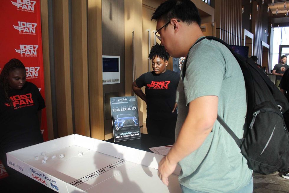 106.7 The Fan's Street Team interacted with listeners at The Sports Junkies Poker Open held at the MGM National Harbor.