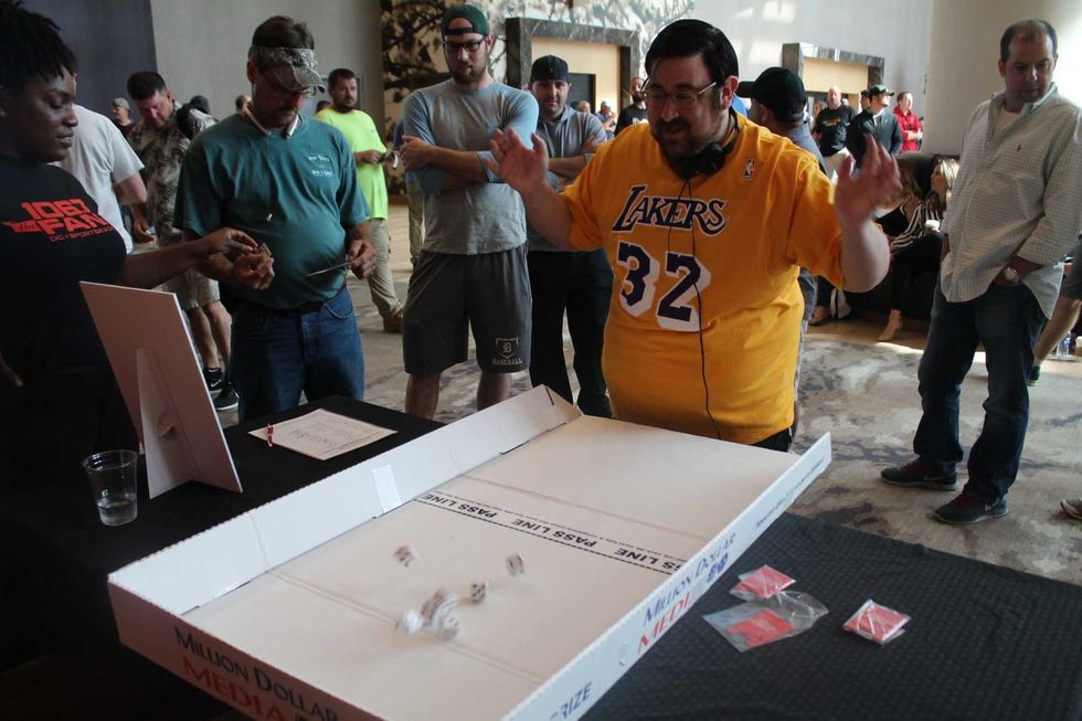 106.7 The Fan's Street Team interacted with listeners at The Sports Junkies Poker Open held at the MGM National Harbor.