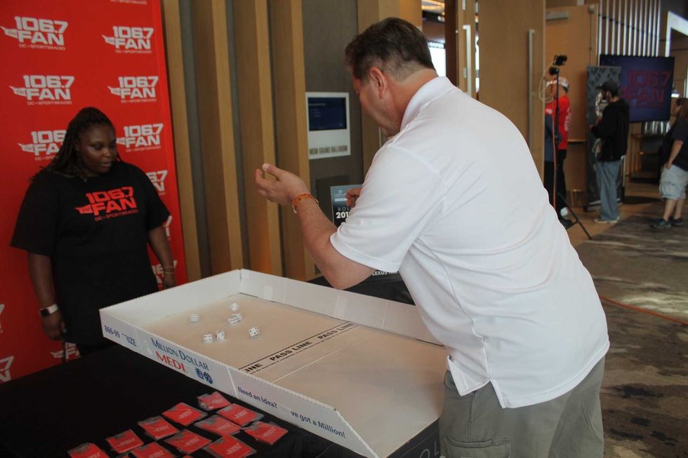 106.7 The Fan's Street Team interacted with listeners at The Sports Junkies Poker Open held at the MGM National Harbor.