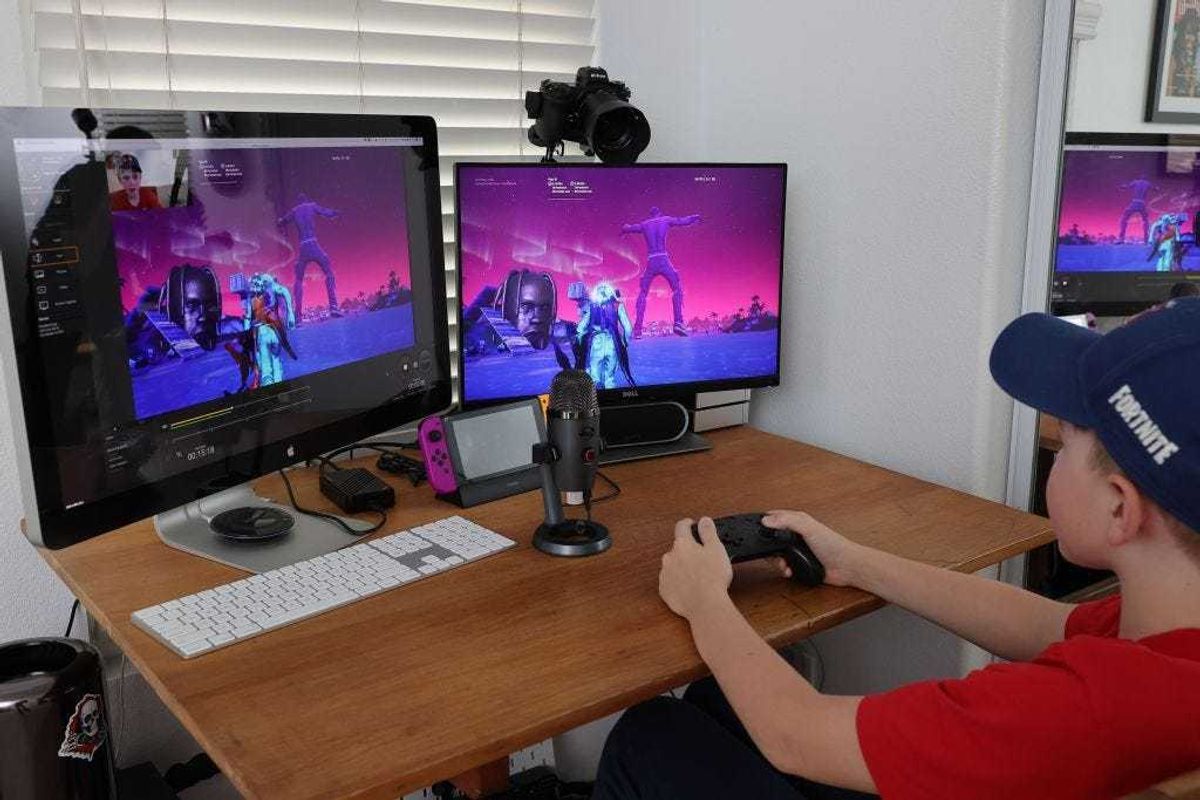 11-year-old Ansel, the photographer’s son, plays Fortnite featuring Travis Scott Presents: Astronomical on April 23, 2020 in South Pasadena, California.