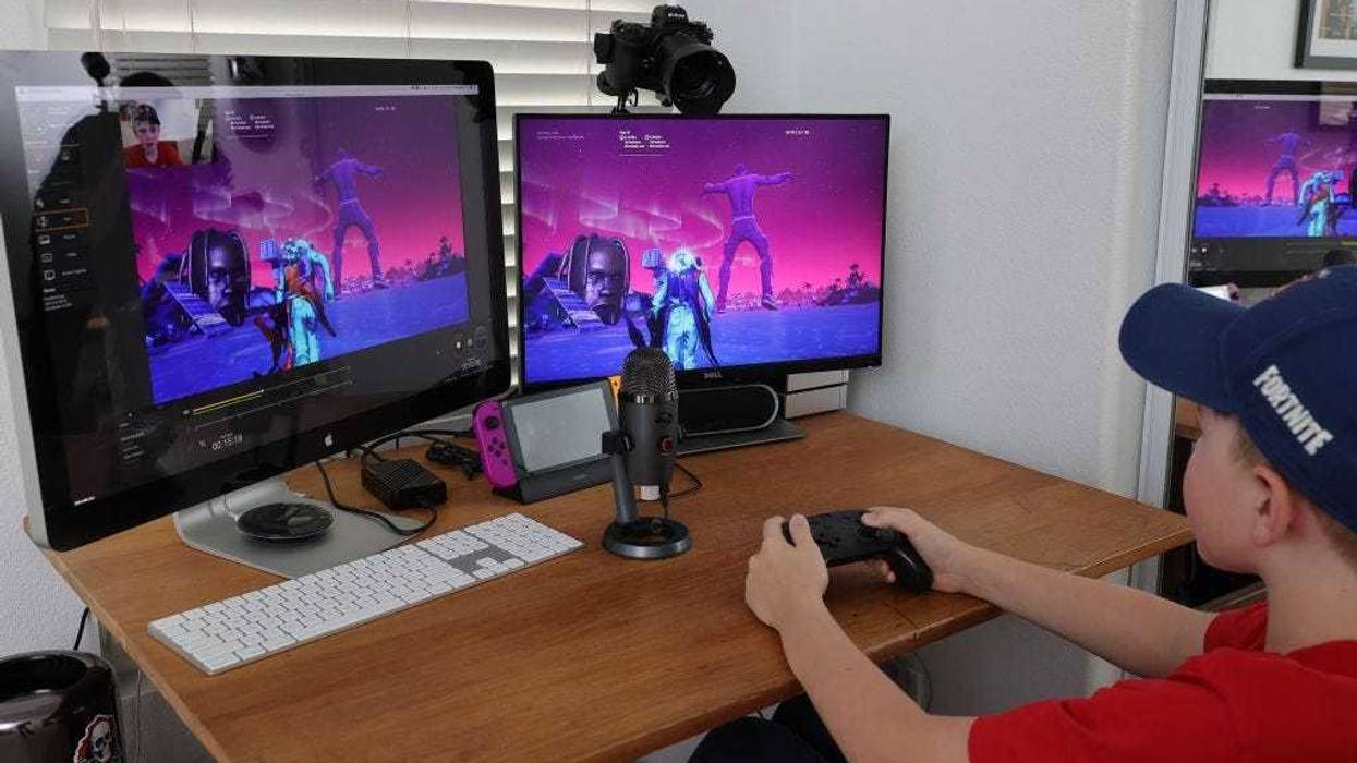 11-year-old Ansel, the photographer’s son, plays Fortnite featuring Travis Scott Presents: Astronomical on April 23, 2020 in South Pasadena, California.
