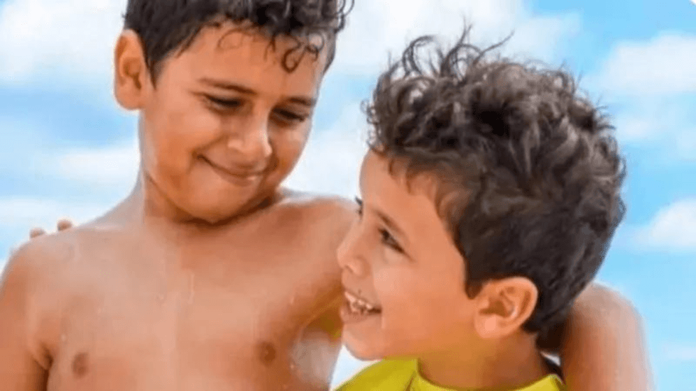 11-year-old Mark Iskander and his 8-year-old brother, Jacob.