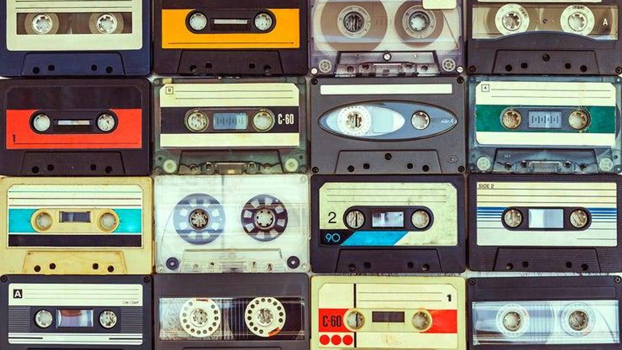 12 cassette tapes with different labels
