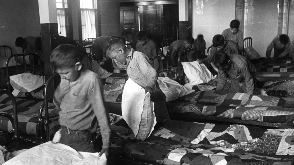 1950: North American Indian children in their dormitory at a Canadian boarding school.