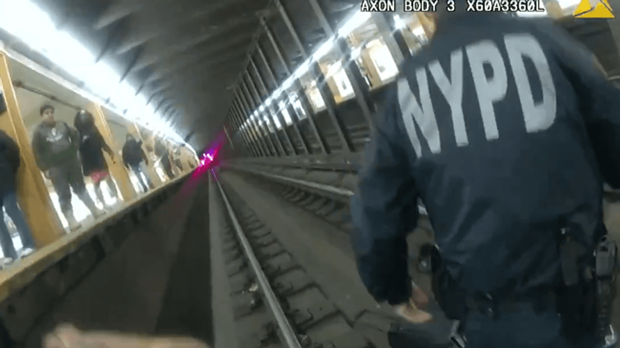 2 NYPD officers rescue unconscious man who fell onto tracks at Brooklyn subway station