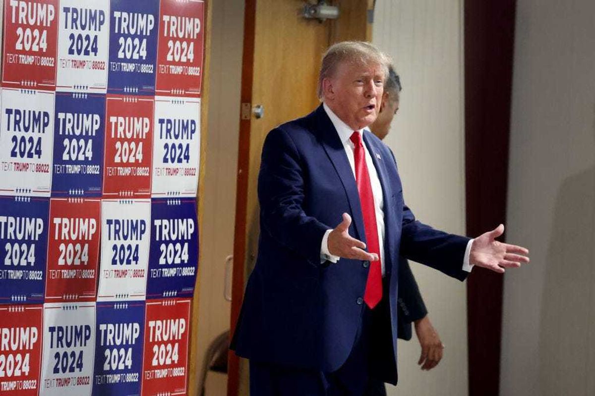 2024 Republican presidential candidate and former U.S. President Donald Trump arrives for a "Commit To Caucus" rally at the Jackson County Fairgrounds on September 20, 2023 in Maquoketa, Iowa.