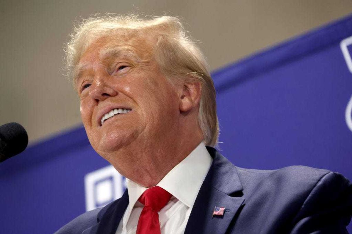 2024 Republican presidential candidate and former U.S. President Donald Trump speaks to guests during a "Commit To Caucus" rally at the Jackson County Fairgrounds on September 20, 2023 in Maquoketa, Iowa.