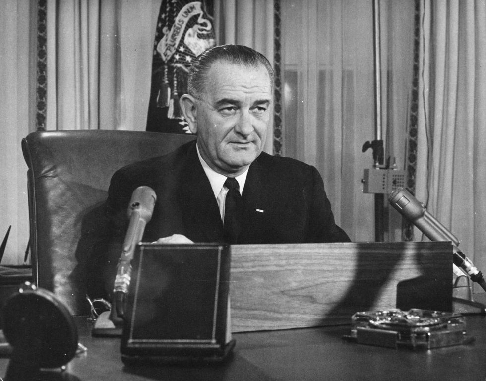 2nd December 1963: American President Lyndon Baines Johnson addresses the nation on his first Thanksgiving Day television program, broadcast from the executive offices of the White House.