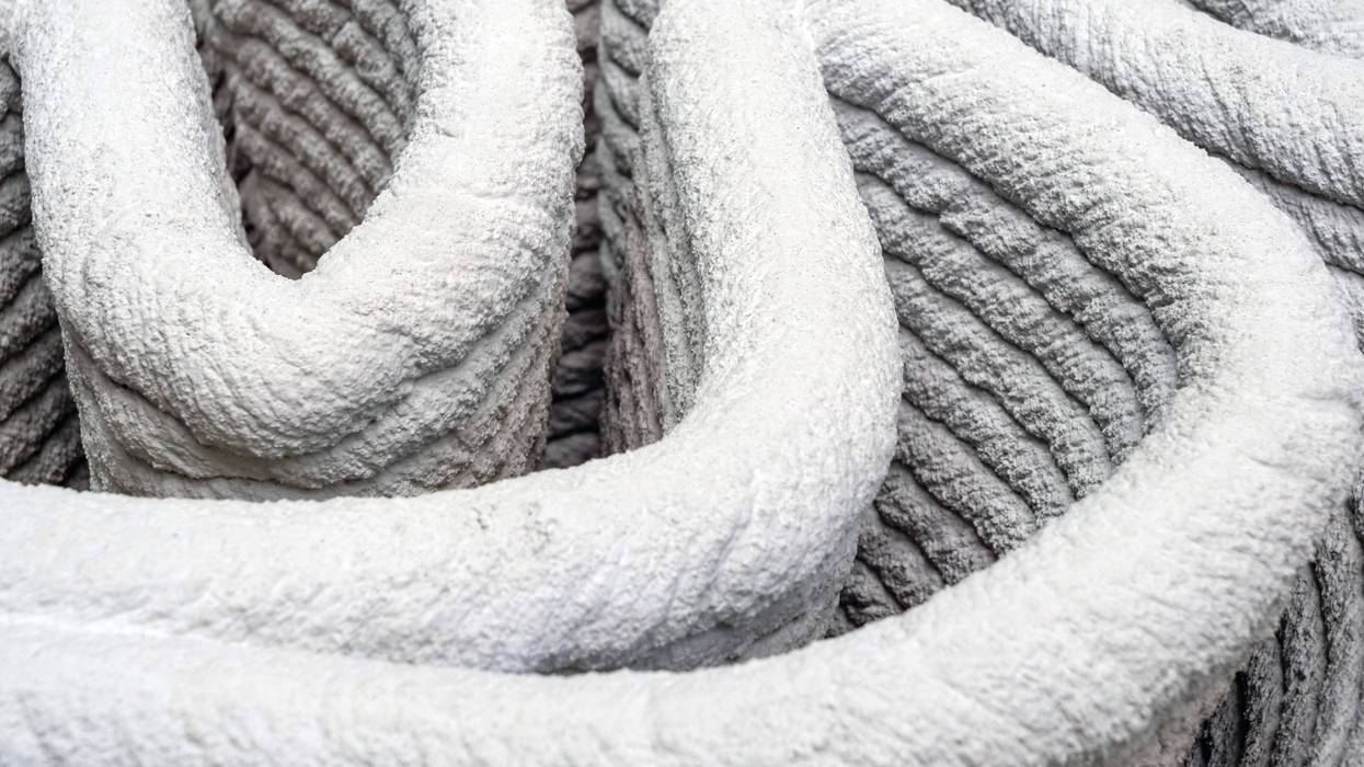 3d printing house buildings technology construction autonomous disrupt concept. Closeup to lime or concrete walls layer.