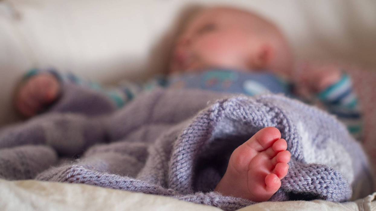 5/19/2017 - File photo dated 24/1/2016 of a baby sleeping in a basket. Getting babies to sleep well at night may halve their risk of obesity as toddlers, research suggests. (Photo by PA Images/Sipa USA)