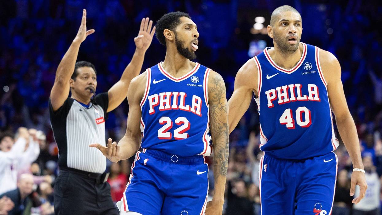 76ers guard Cameron Payne (22) reacts next to forward Nicolas Batum (40) after his three pointer against the Miami Heat.
