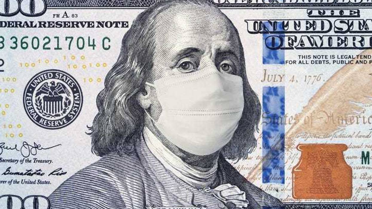 A 100 dollar bill with Benjamin Franklin wearing a mask, depict funding for the pandemic.