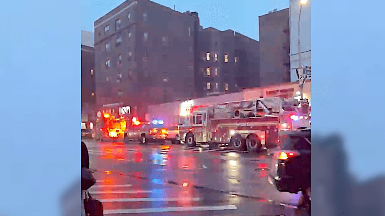 A 12-year-old fell between train cars on the R line in Elmhurst on Wednesday evening