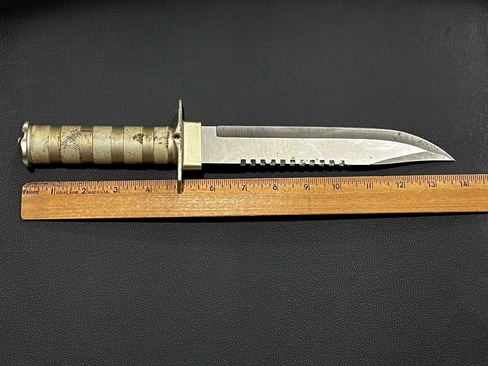 A 14-inch knife was found on the suspect after he was stopped on the street, police said