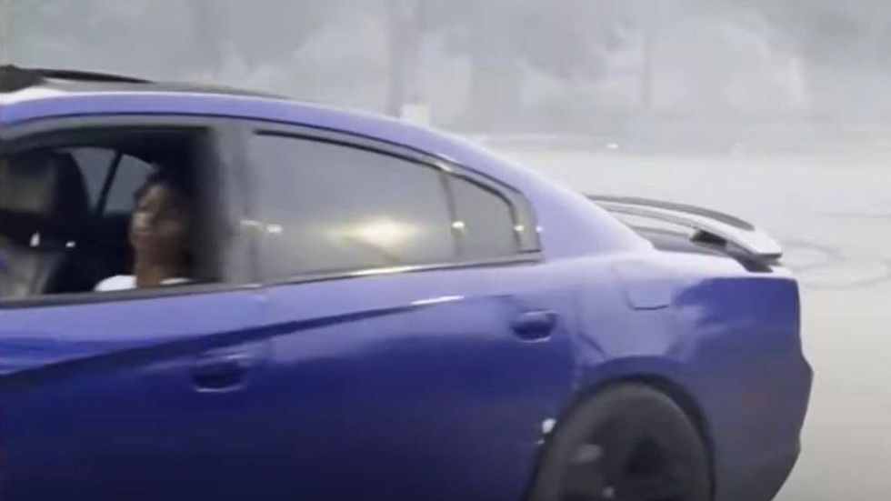 A 2013 Dodge Charger and a person whom Philadelphia police want to speak with after a shooting death on 2400 Kelly Drive on July 16.