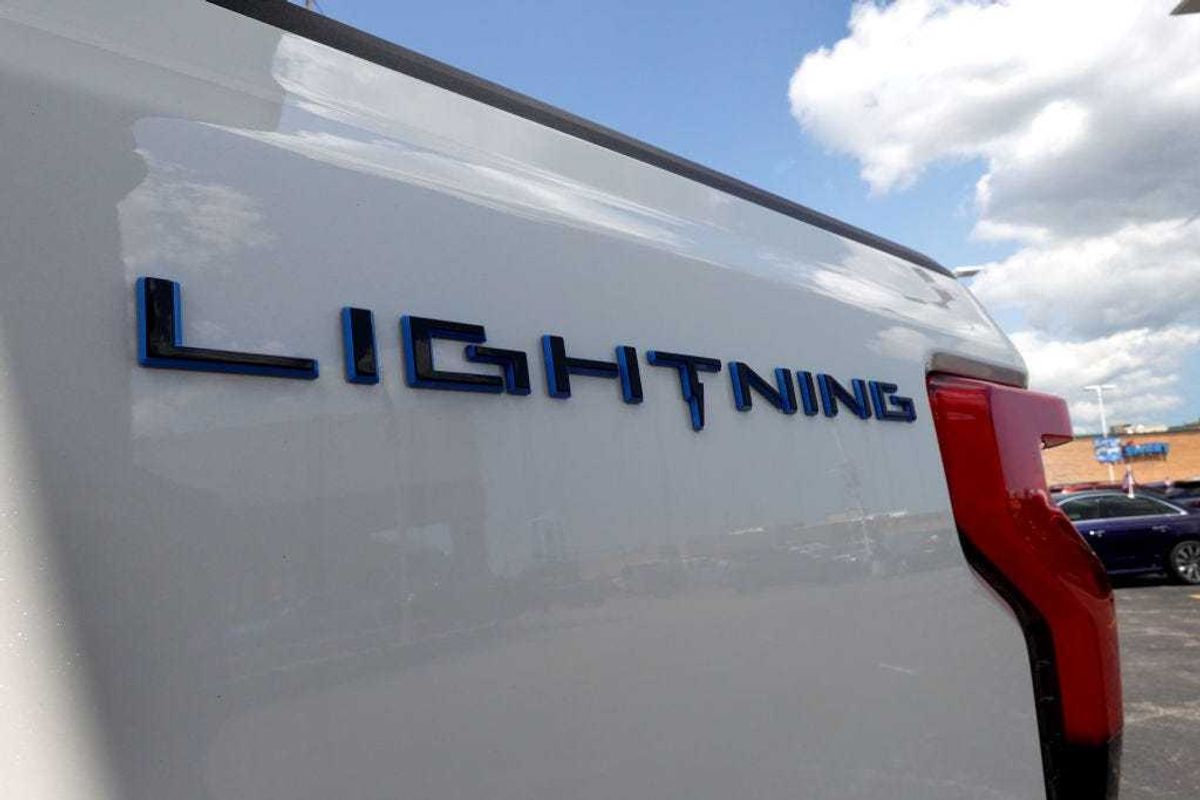 A 2023 Ford F-150 Lightning EV is offered for sale at Golf Mill Ford on July 18, 2023 in Niles, Illinois. Yesterday Ford announced that it was cutting prices on the Lightning truck by as much as $10,000. (Photo by Scott Olson/Getty Images)