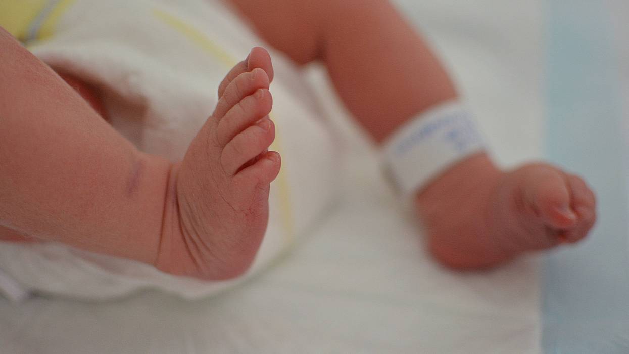 A 25-year-old man from the Tri-Cities area was arraigned on one charge of child abuse after police say his infant suffered from multiple broken bones in Northern Michigan.