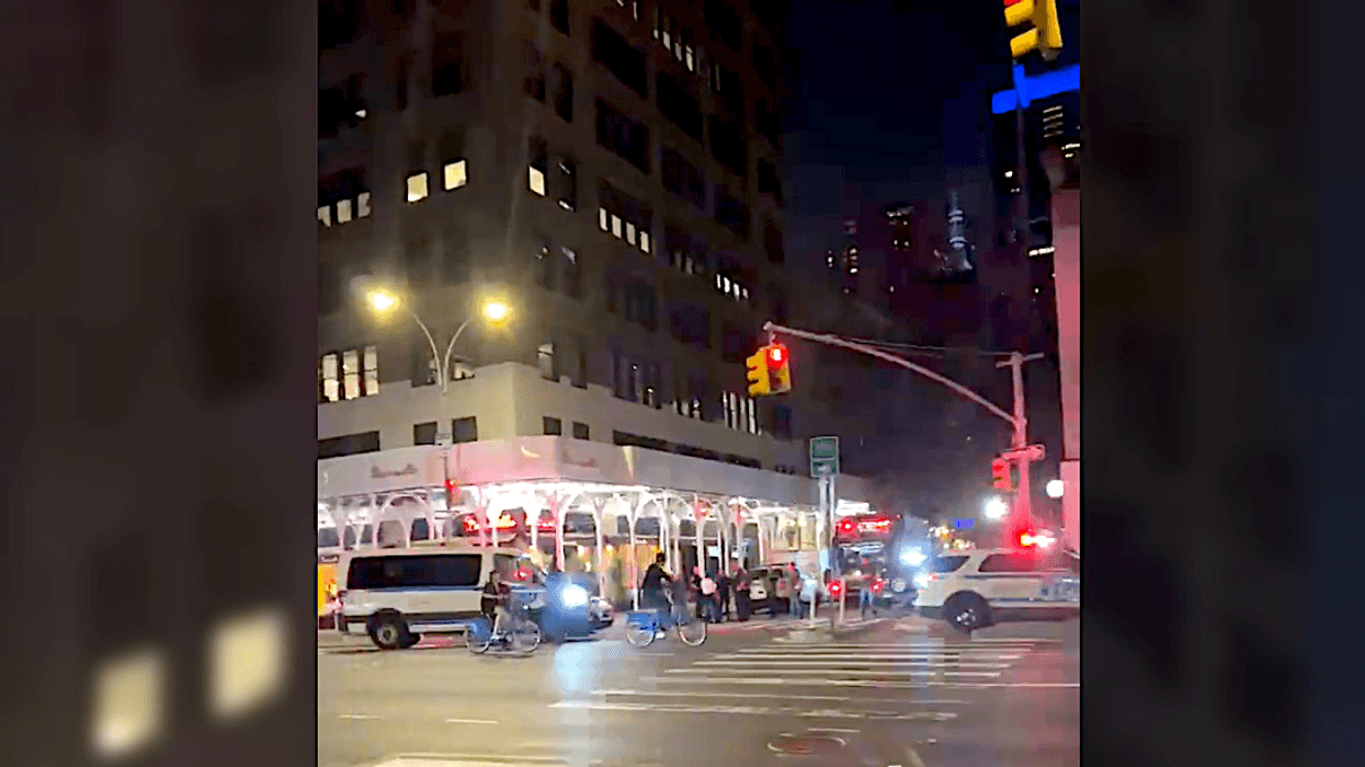 A 28-year-old person of interest was arrested about a block away from the scene of the stabbing at W. 44th Street and Eighth Avenue