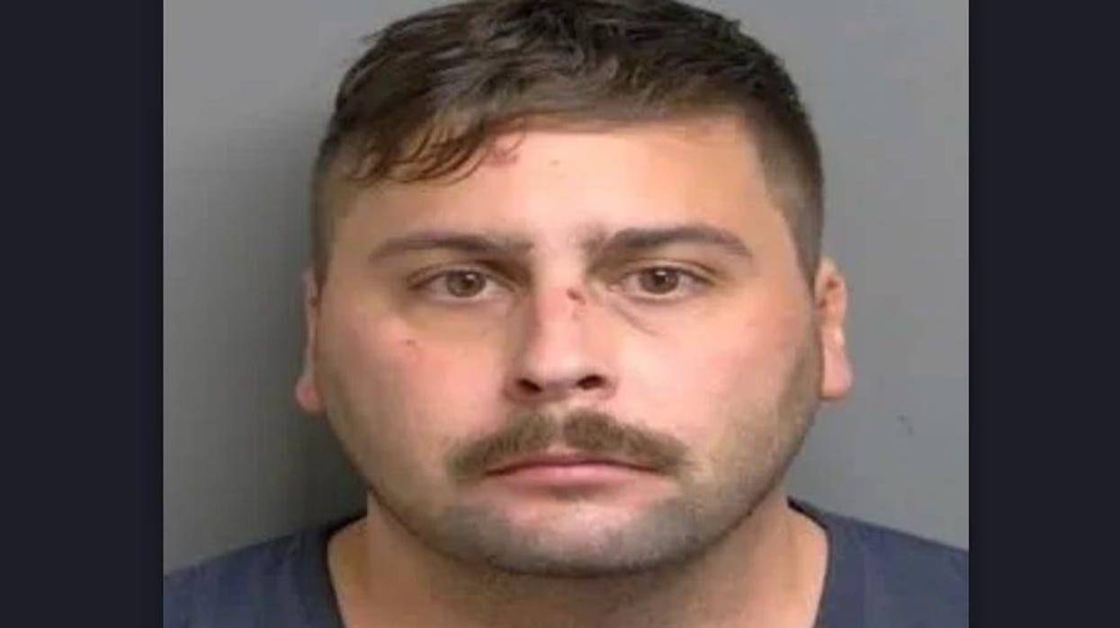A 30-year-old Clinton Township man is facing murder charges and more after prosectors claim he fired multiple shots at his wife and killed her as she was on the phone with a 911 operator this week.