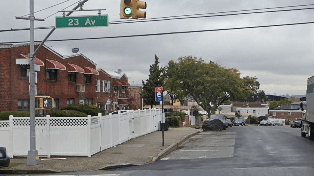 A 30-year-old woman was stabbed at a bus stop in East Elmhurst early Monday morning.