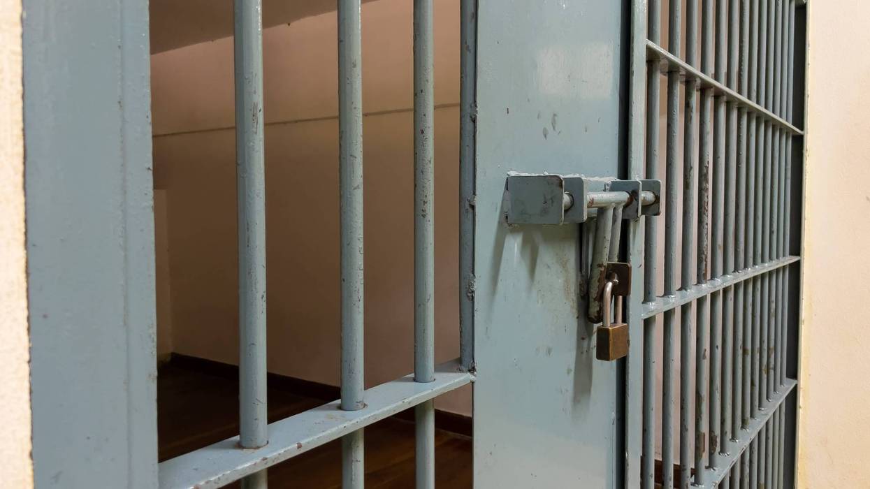 A 51-year-old man suspected of going to a Department of Motor Vehicles office in Hemet with a shotgun in his car was behind bars Tuesday.