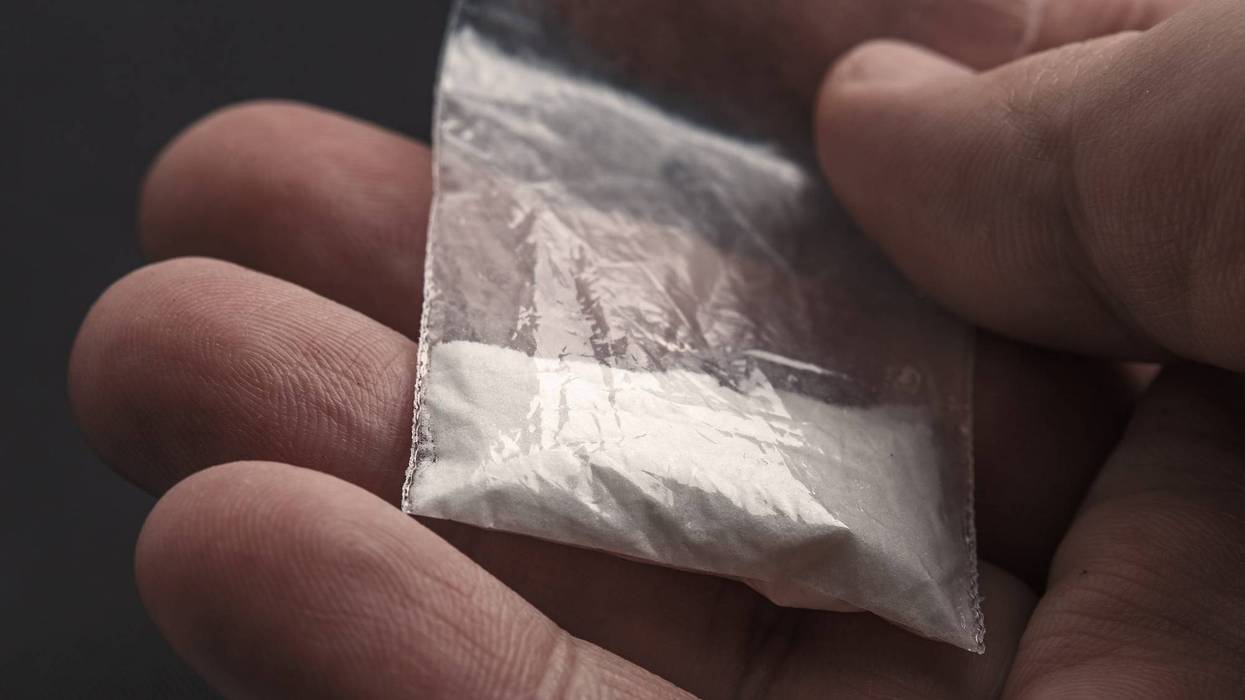 A 59-year-old man was arrested by authorities after a small plastic baggie containing cocaine was left behind when he paid for items at an Alpena Walmart.