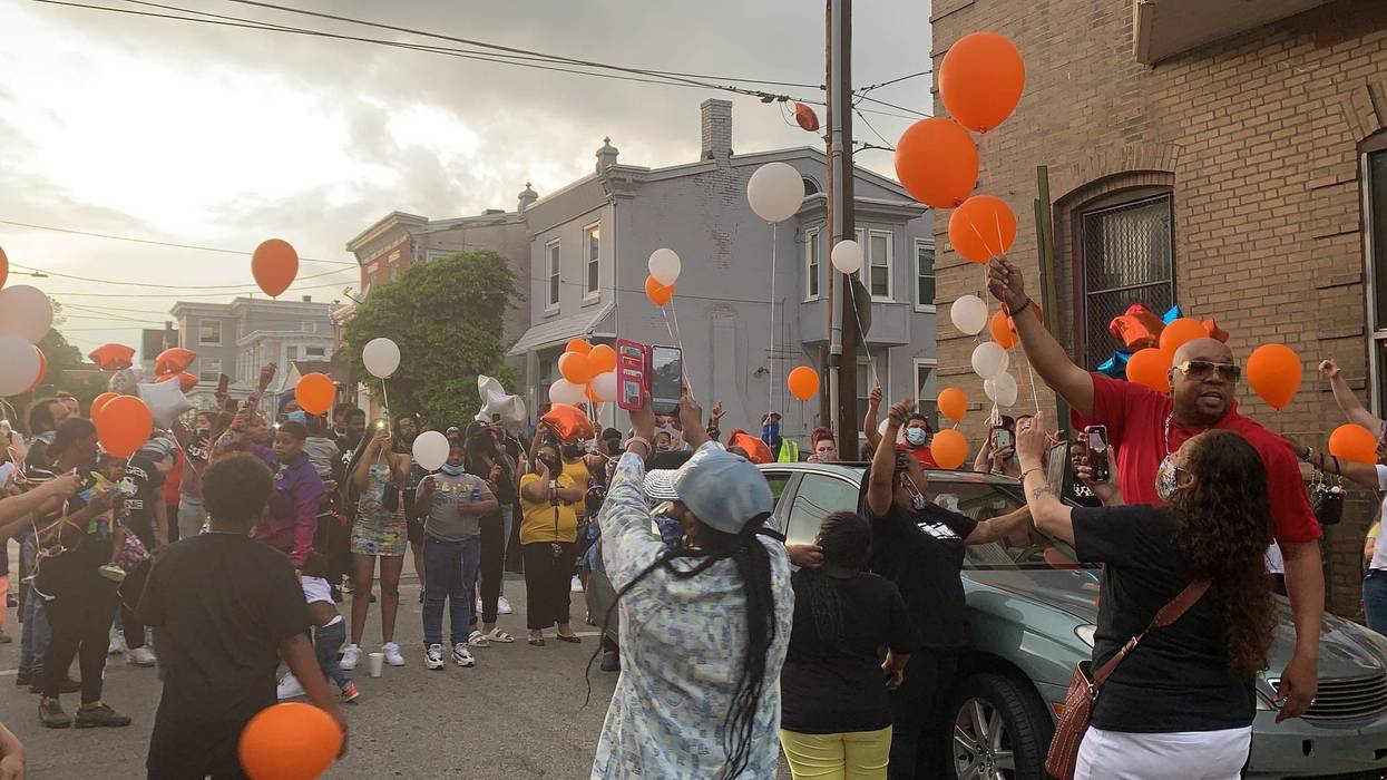 A balloon release at a memorial event for Alezauna Carter, 13.