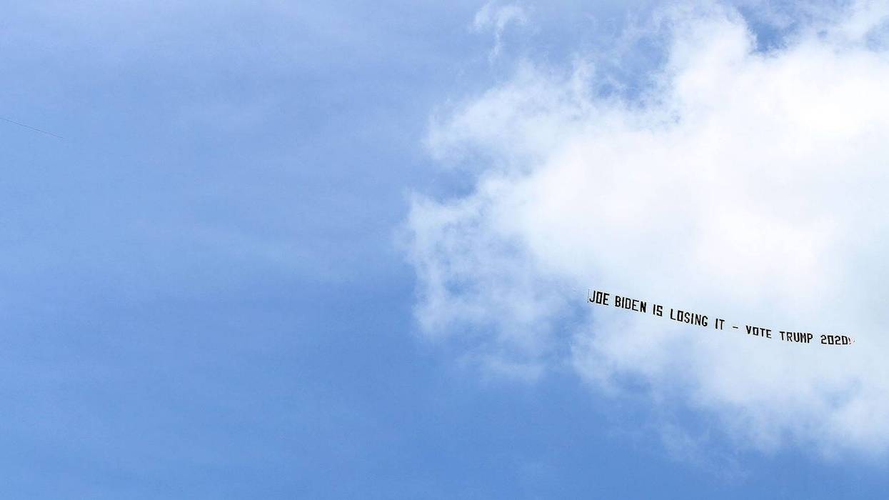 A banner plane files over the Chase Center in Wilmington, DE, Thursday, August 20, 2020. This facility is the home for the Democratic National Convention. Wilmingtondnc0820a