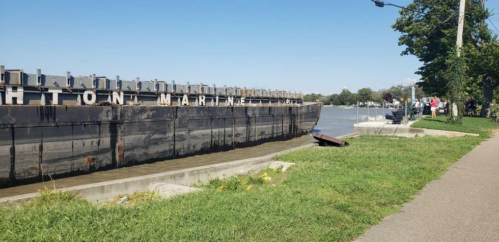 A barge being towed from Erie to Buffalo came loose overnight and is now beached at Van Buren Point near Dunkirk. The Coast Guard says the owner hopes to have it out tomorrow.