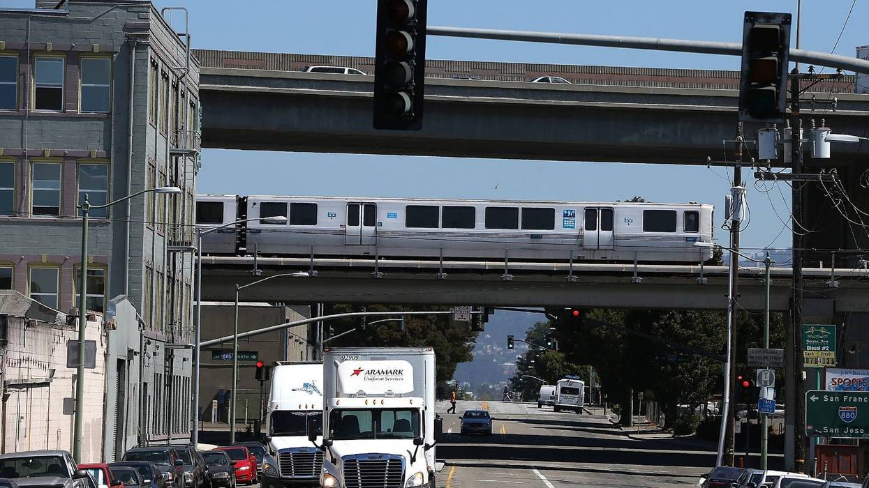 : A Bay Area Rapid Transit (BART) train travels towards downtown Oakland on August 2, 2013 in Oakland, California.