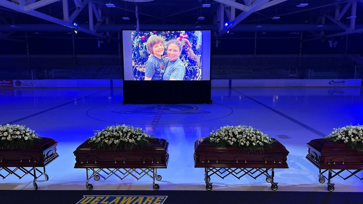 A beloved skating coach, two young skaters and their parents were laid to rest Saturday in Delaware.