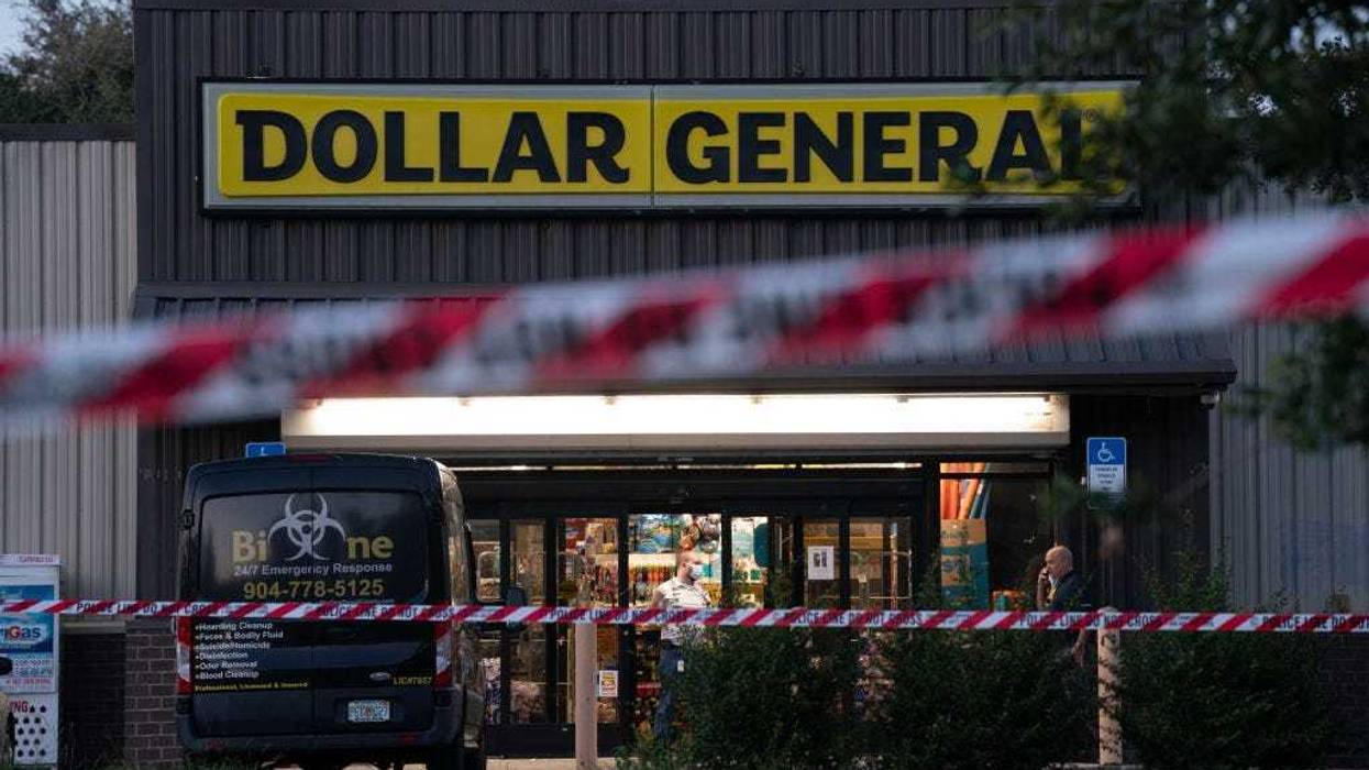 A biohazard cleanup vehicle is parked outside the Dollar General store where three people were shot and killed the day before on August 27, 2023 in Jacksonville, Florida.