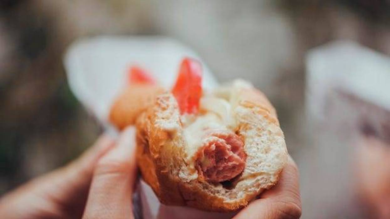 A bite out of a hot dog
