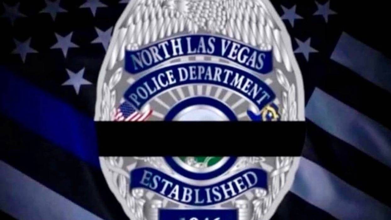 A black band around a North Las Vegas Police badge signifies a fallen officer