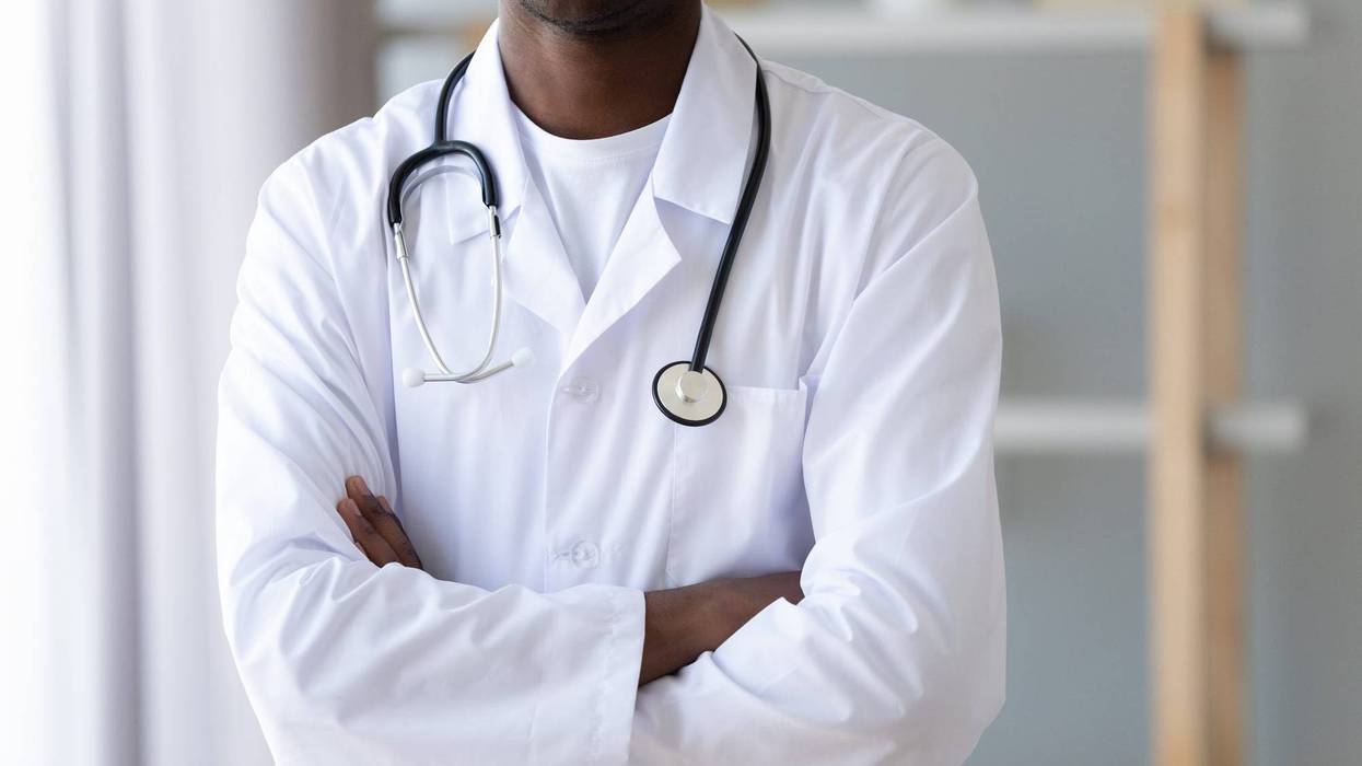 A Black doctor.