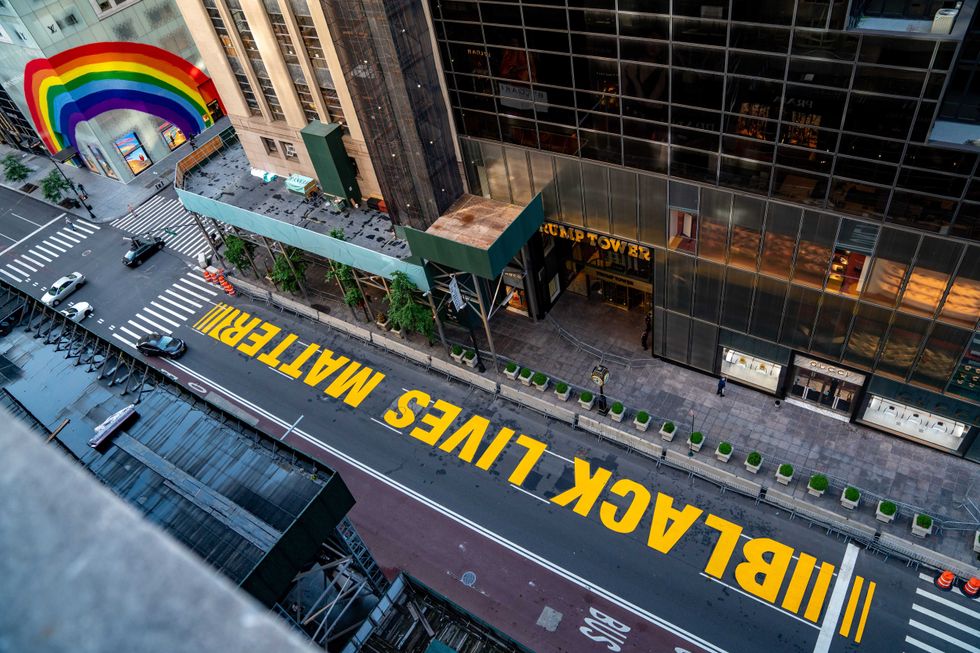 A Black Lives Matter mural that was painted on 5th Avenue is seen directly in front of Trump Tower on July 13, 2020 in New York City. In a tweet, President Trump called the mural a "symbol of hate" and said that it would be "denigrating this luxury Avenue".