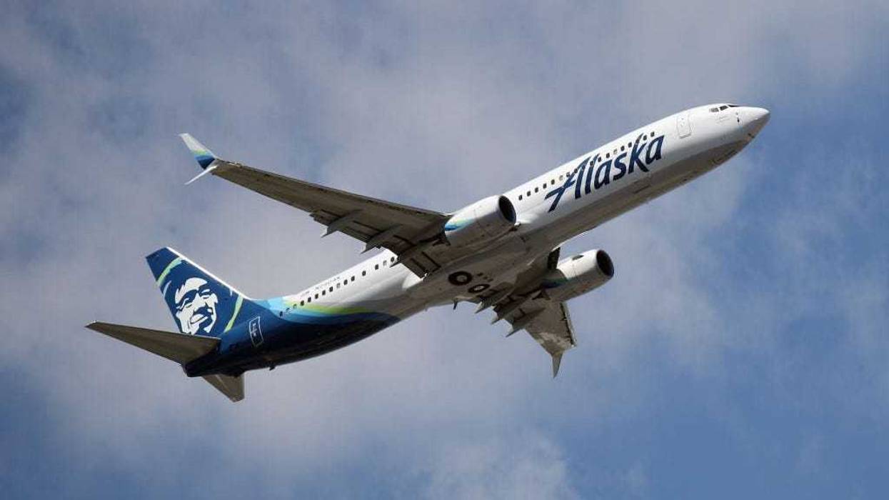 A Boeing 737-990 (ER) operated by Alaska Airlines takes off from JFK Airport on August 24, 2019 in the Queens borough of New York City.