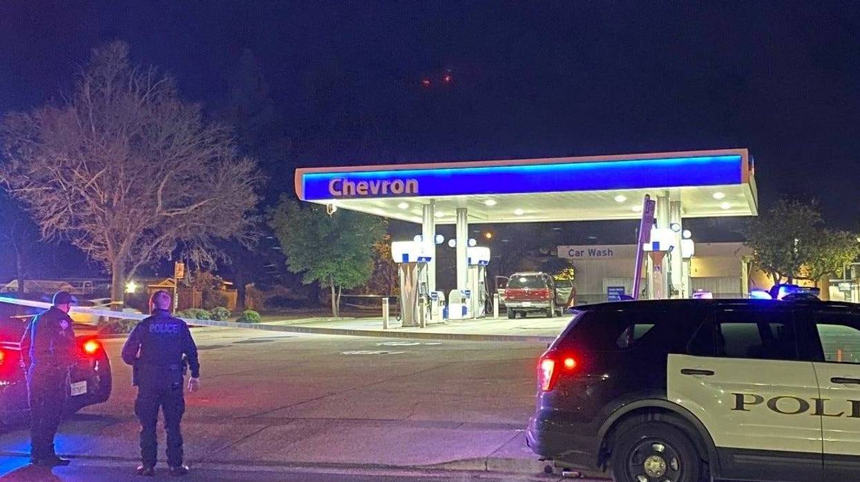 A bomb squad has shut down a station in Pleasant Hill after two people were allegedly found with an explosive device.