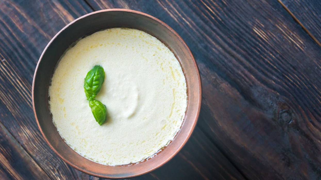 a bowl of Alfredo sauce.