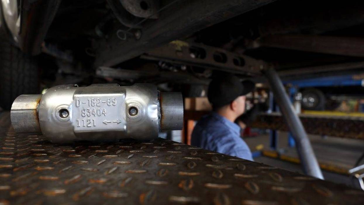 A brand new catalytic converter sits on a car lift at Johnny Franklin's Muffler on July 11, 2022 in San Rafael, California.