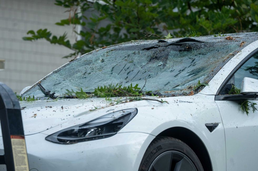 A broken windshield of a vehicle after a tree fell on Sussex Road in Teaneck on Thursday, Aug. 14, 2025