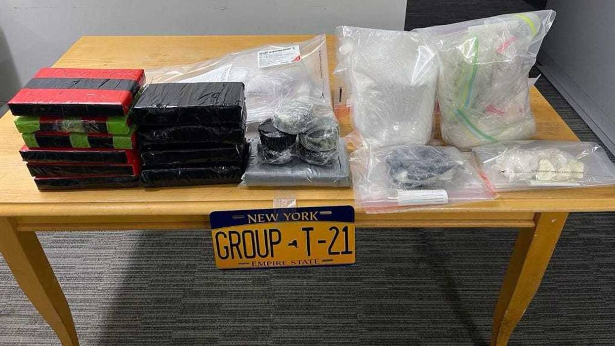 A Bronx man was arrested Monday after about 50 pounds of narcotics was found in an apartment, including hidden in a coffee table compartment.