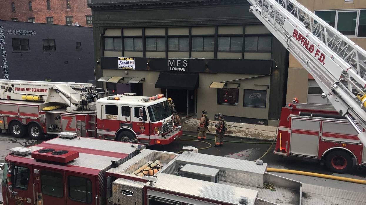 A Buffalo firefighter fell through the first floor to the basement at a downtown fire on Franklin Street Monday morning