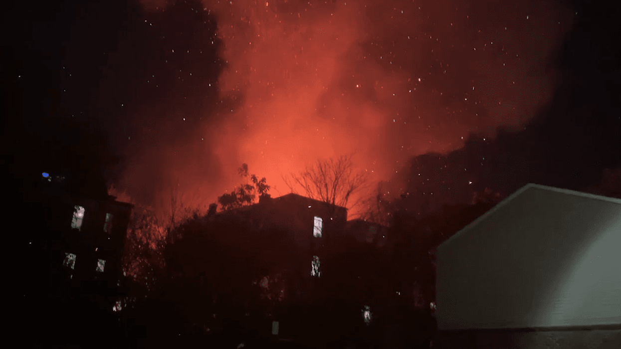 A building fire in Newark spread to two occupied residential buildings, displacing 30 people. Four firefighters were injured in the response.