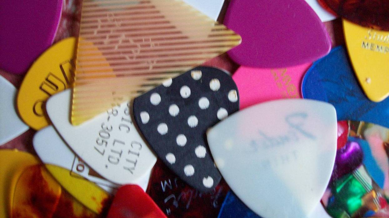 a bunch of colorful guitar picks