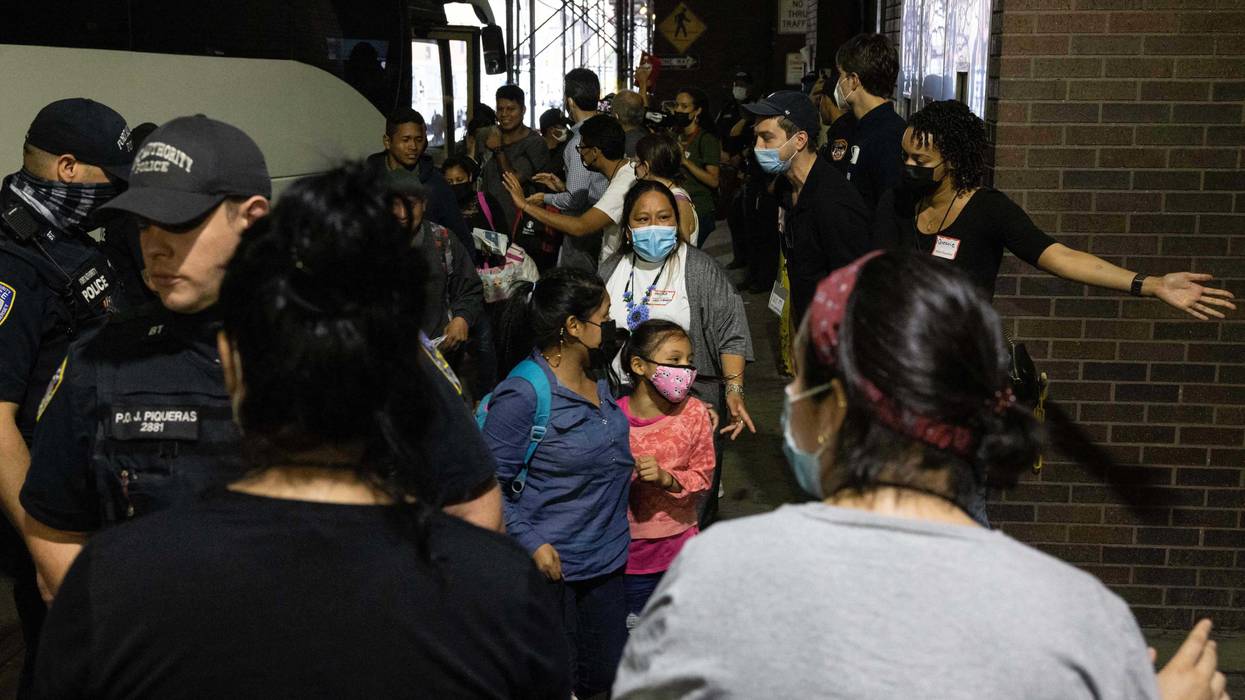 A bus carrying migrants from Texas arrives at Port Authority Bus Terminal on August 10, 2022 in New York. - Texas has sent thousands of migrants from the border state into Washington, DC, New York City, and other areas.