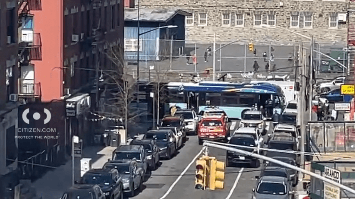 A BX41 bus crashed with the DSNY car at around 9:20 a.m. at the intersection of Webster Avenue and 187th Street in Fordham Heights, according to police.
