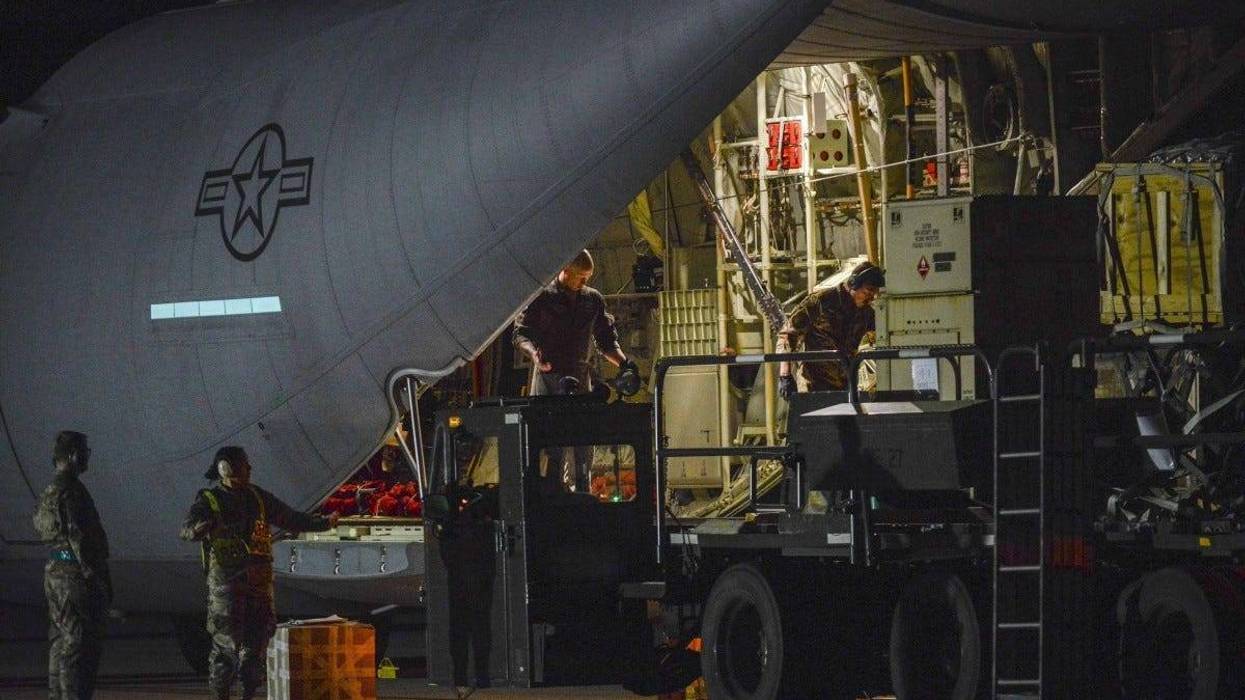 A C-130 Hercules stationed out of Ramstein Air Base, Germany delivers pallets of medical equipment to Aviano Air Base, Italy, March 20, 2020
